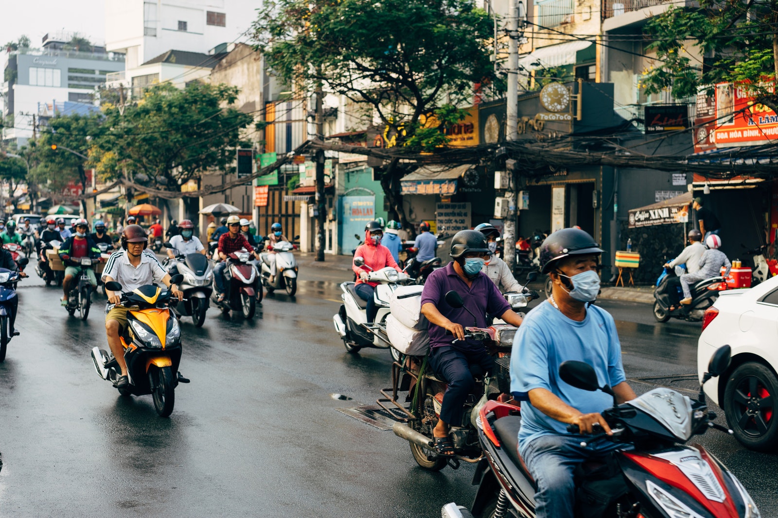 People Riding Motorcycle on Road