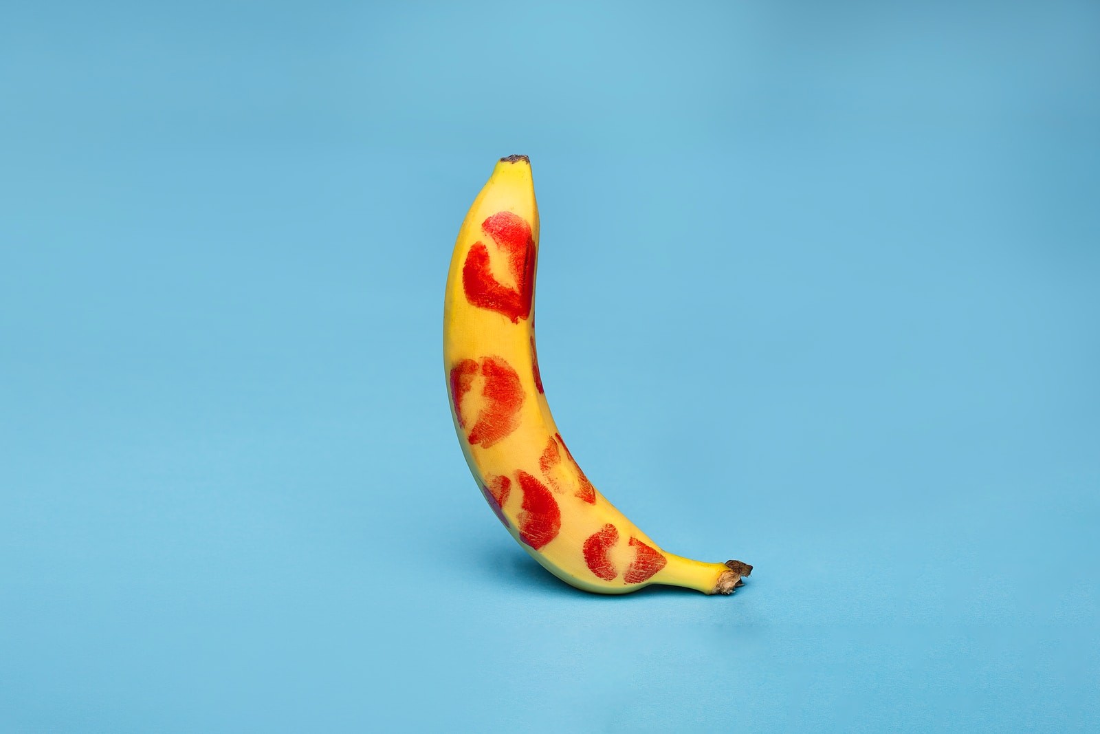 yellow banana fruit on white table