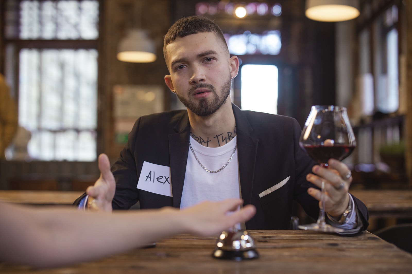 A Man Holding a Wine Glass