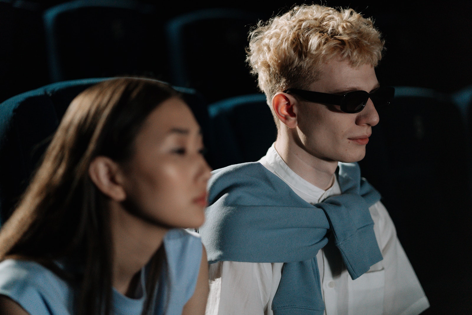 Man in Black Sunglasses Beside a Woman