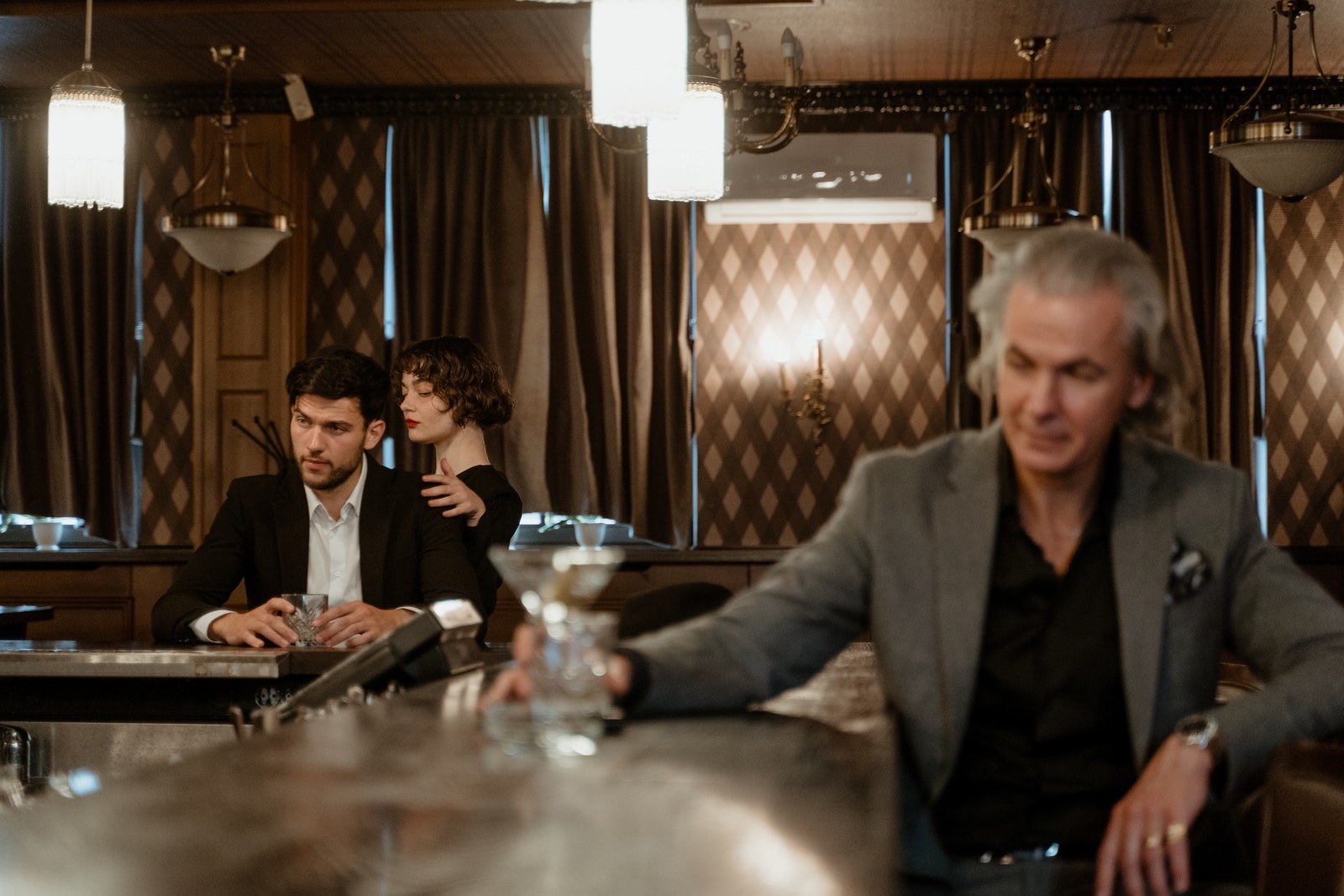 People sitting beside Bar Counter